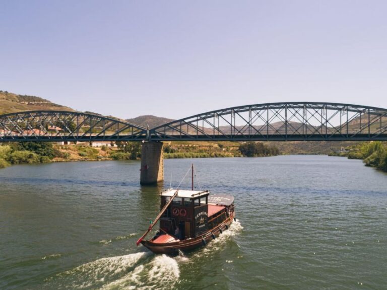 From Pinhão: Douro Valley Rabelo Boat Tour with Audio Guide - The Rabelo Boat Experience: Comfortable, Local, and Not Pretend-Fancy