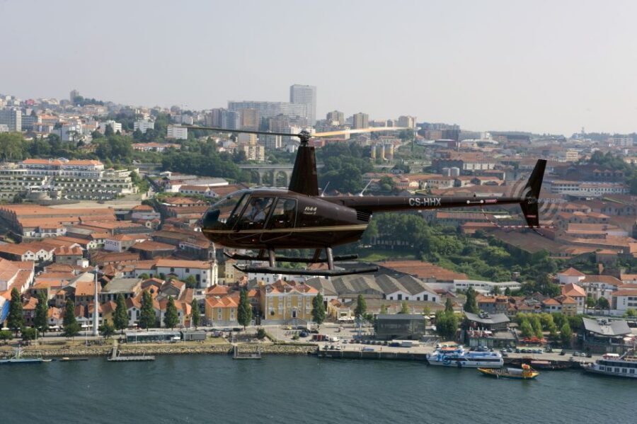 From Porto: City and Douro River Helicopter Sightseeing Tour - Arrábida Bridge to Luís I: seeing Douro spans the way locals do