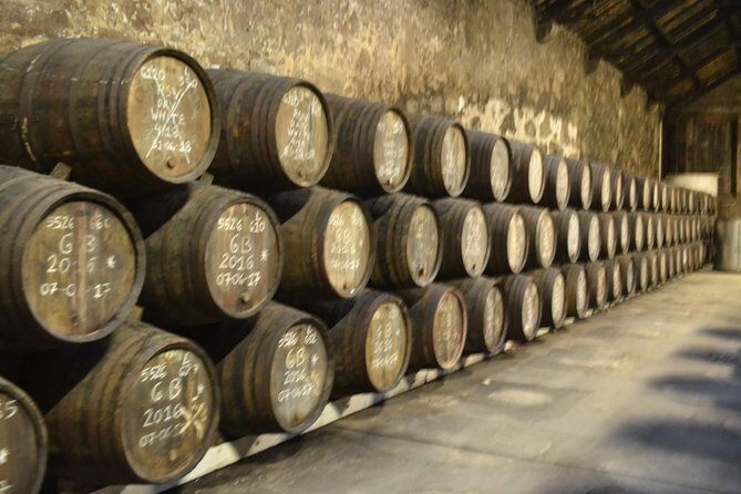 Porto: Port and Douro Wine Walking Tour With 9 Wine Tastings - Stop 3: Fonseca Porto Cellar Time and a Real Port Lesson