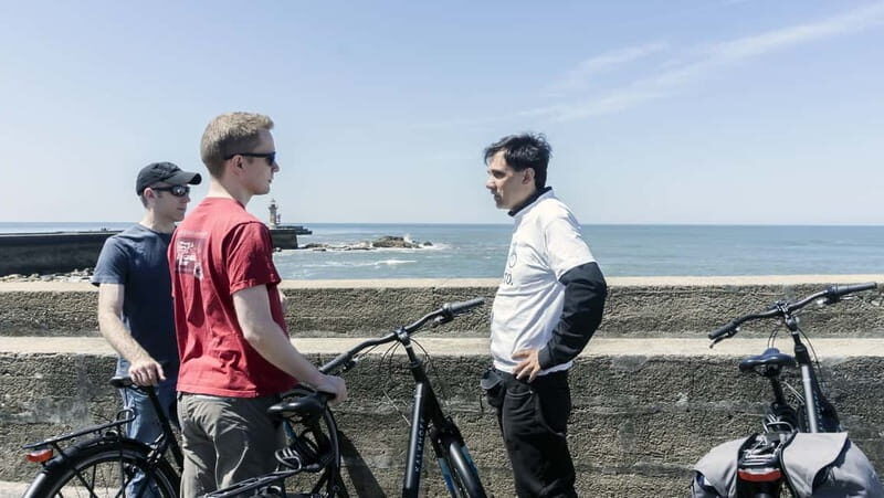 Porto Private E-Bike Tour: Douro River, Parks & Beaches - Arrábida Bridge, fountains, and coastal lighthouses